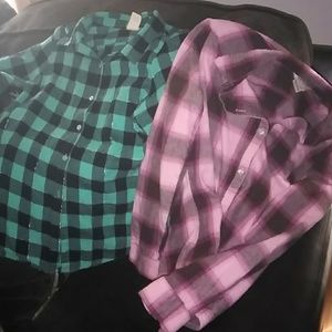 2 girls' flannel shirts